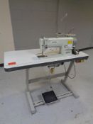 A Brother industrial sewing machine in table