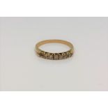 An 18ct gold six stone diamond ring (one stone missing), size N CONDITION REPORT: 1.