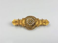A 15ct gold pearl and diamond brooch CONDITION REPORT: 5.