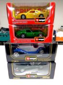 Four Burago die cast vehicles 1/18 and 1/24 scale to include Alpha Romeo,
