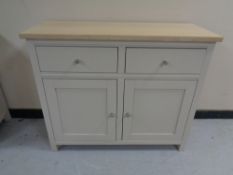 A painted double door sideboard fitted two drawers with a pine effect top (metal handles)