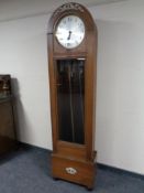 A 20th century oak cased regulator clock with silvered dial