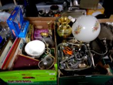 Two boxes of miscellany to include games, cutlery, plated trays, candelabra,