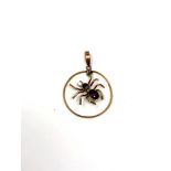 A vintage 9ct spider pendant