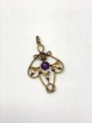 A 9ct gold pendant set with amethyst