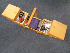 A concertina sewing box and contents