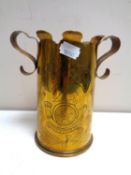 A World War I era trench art brass ammunition shell