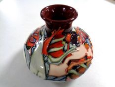 A Moorcroft Simeon pattern vase, height 9.