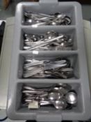 A tray of stainless steel cutlery