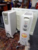 Two Dragon oil filled radiators together with a further oil filled radiator
