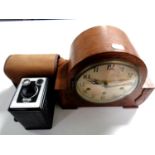 A 1930s oak Westminster chime mantel clock with silver dial together with a Brownie box camera