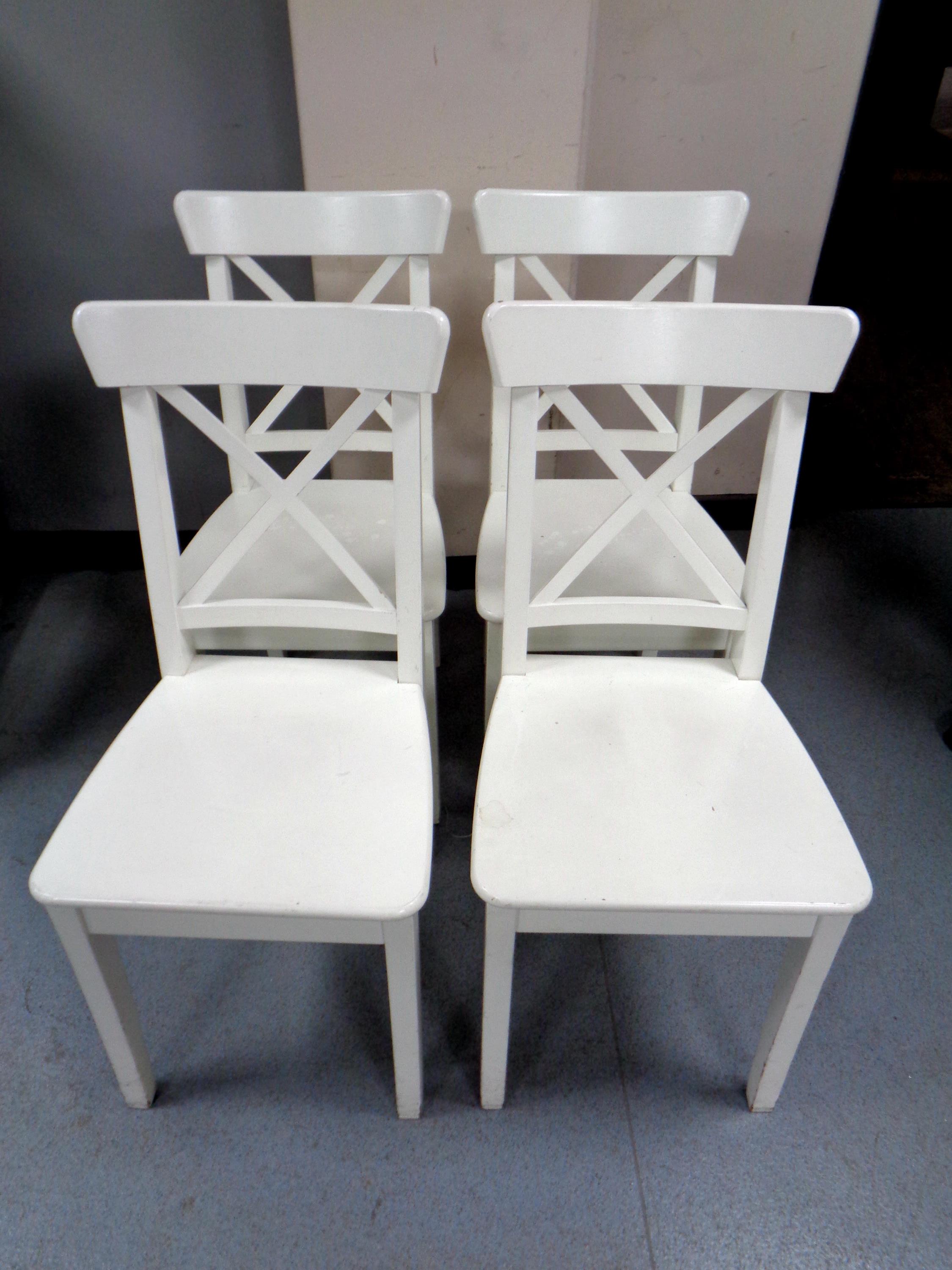 A set of 23 Ikea Ingolf dining chairs