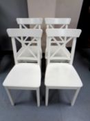 A set of 23 Ikea Ingolf dining chairs