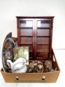 A box containing curio cabinets, Japanese tea china,