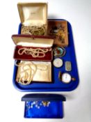 A tray containing costume jewellery to include simulated pearls, silver pocket watch,