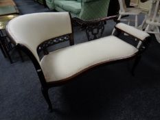 A carved Victorian style chaise lounge