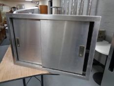 A Vogue stainless steel double door wall cabinet,