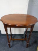An Edwardian oak shaped barley twist leg occasional table together with a baize topped card table