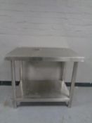 A stainless steel two tier prep table,