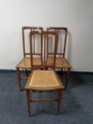 A set of three mahogany bedroom chairs with rattan seats