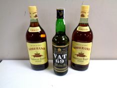Two bottles of Soberano brandy together with a bottle of Vat 69 Scotch whisky