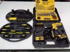 A cased DeWalt 18V drill with accessories together with a Work Zone screwdriver set and a DeWalt