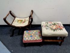 An early 20th century X framed dressing table stool and two further footstools
