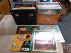 Three cases containing a quantity of vinyl LPs and 78s