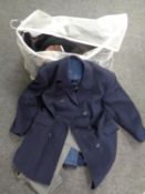 A bag containing a large quantity of gent's clothing to include coats, jackets,