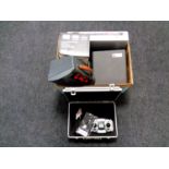 A box containing Samsung DVD VCR recorder, cased Kodak projector, a Yamaha guitar amplifier,