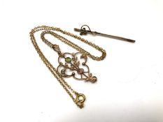 An Edwardian peridot and seed pearl pendant on chain (a/f) together with a 9ct gold bar brooch.