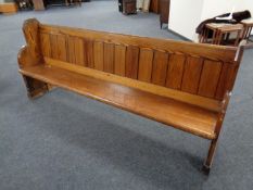 A late Victorian pitch pine pew