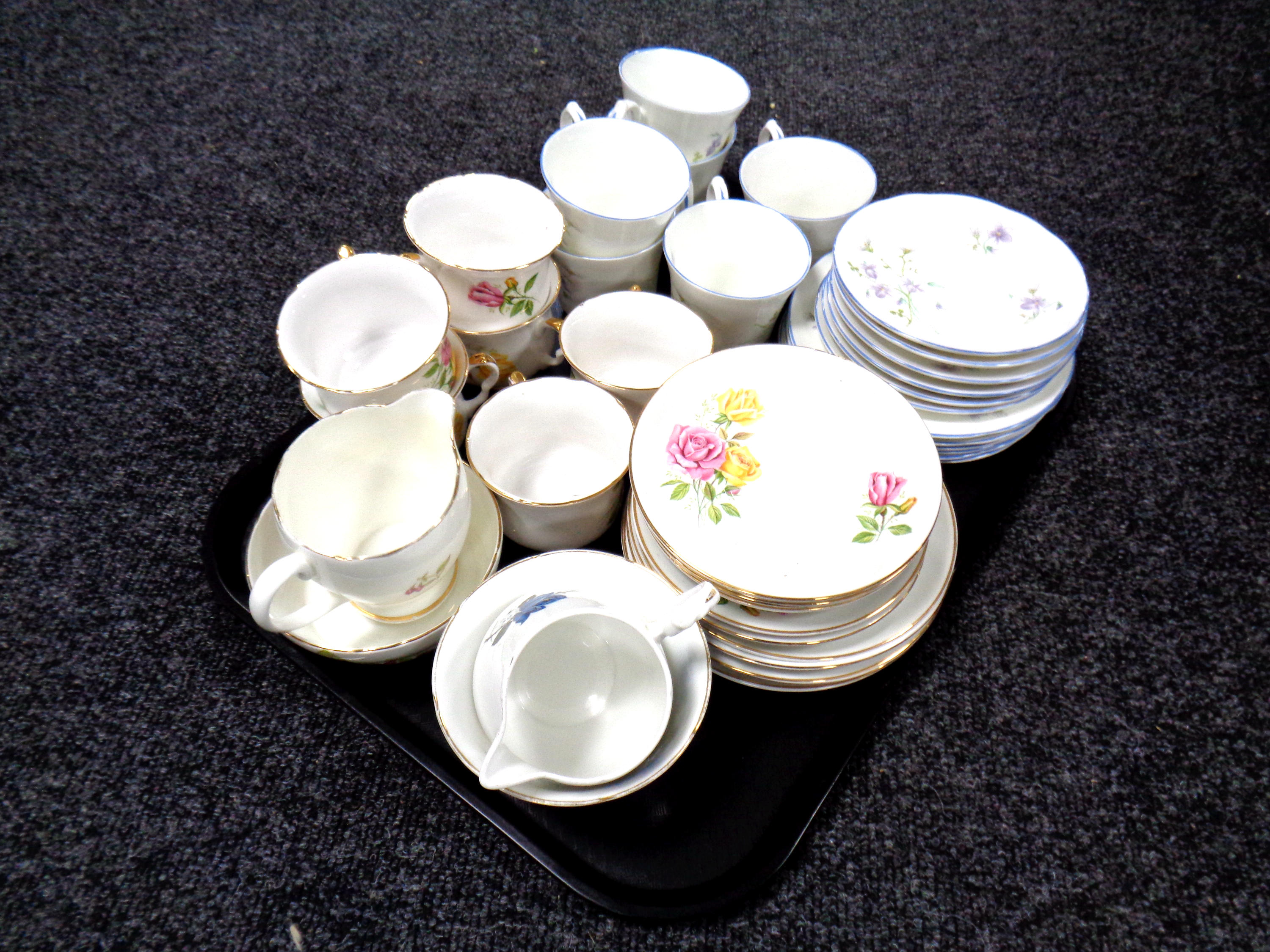 A tray containing six Springfield bone china trios together with six further Dorchester bone china