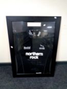 A signed Newcastle Falcons Northern Rock rugby top from the 2005-2006 season,