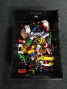 A crate containing a quantity of die cast cars