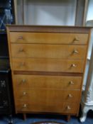 A 20th century teak chest of six drawers