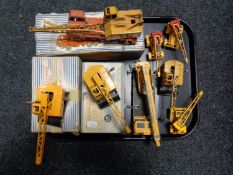 A tray containing boxed and unboxed Dinky and Matchbox die cast cranes to include Dinky Super toys