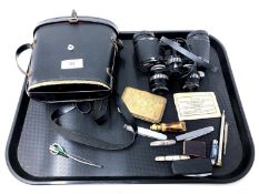 A tray of cased Prinzlux binoculars, vintage brass purse, pocket knives,