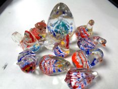 Nine glass animal paperweights together with a further paperweight