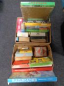 Two boxes containing a quantity of vintage board games