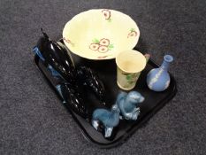 A tray containing assorted ceramics to include three Poole Pottery dolphins together with two