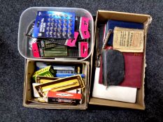 A tray containing miniature bibles, French conversation book, dictionaries,