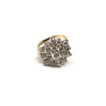 A 9ct gold CZ cluster ring, size P. CONDITION REPORT: 6g.