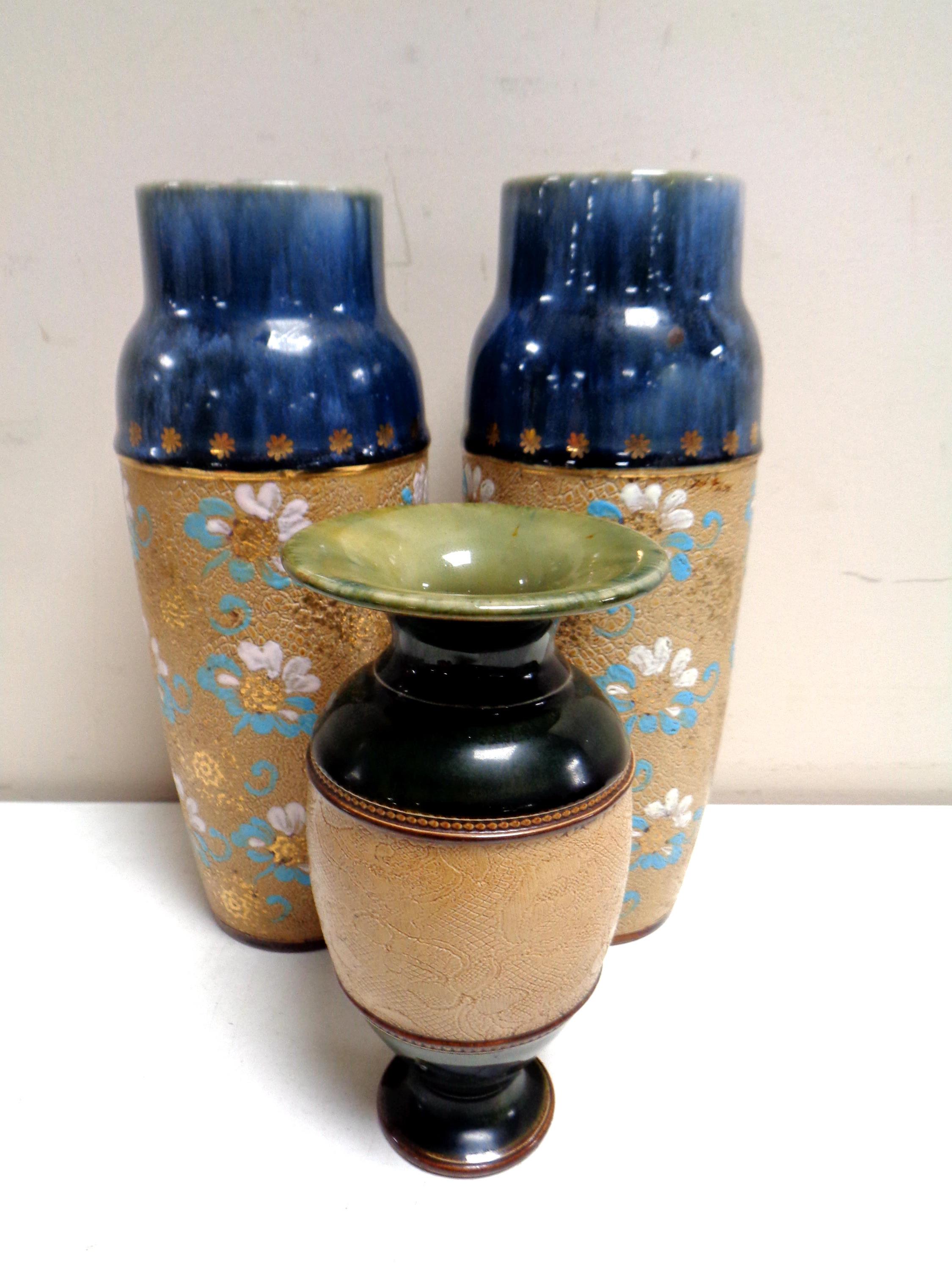 A pair of Royal Doulton glazed pottery vases, height 23.