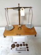 A set of 20th century chemist's balance scales together with a case containing weights