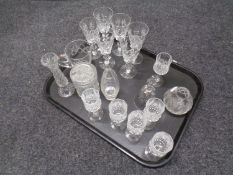 A tray containing 20th century cut glass to include liqueur glasses, preserve pot,