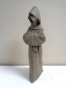 A Lladro matte glazed figure of a monk