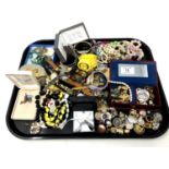 A tray of costume jewellery, wristwatches etc.