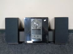 A Bang and Olufsen music centre with speakers (as found)