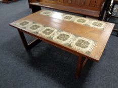 A 20th century continental teak rectangular coffee table with tile insets